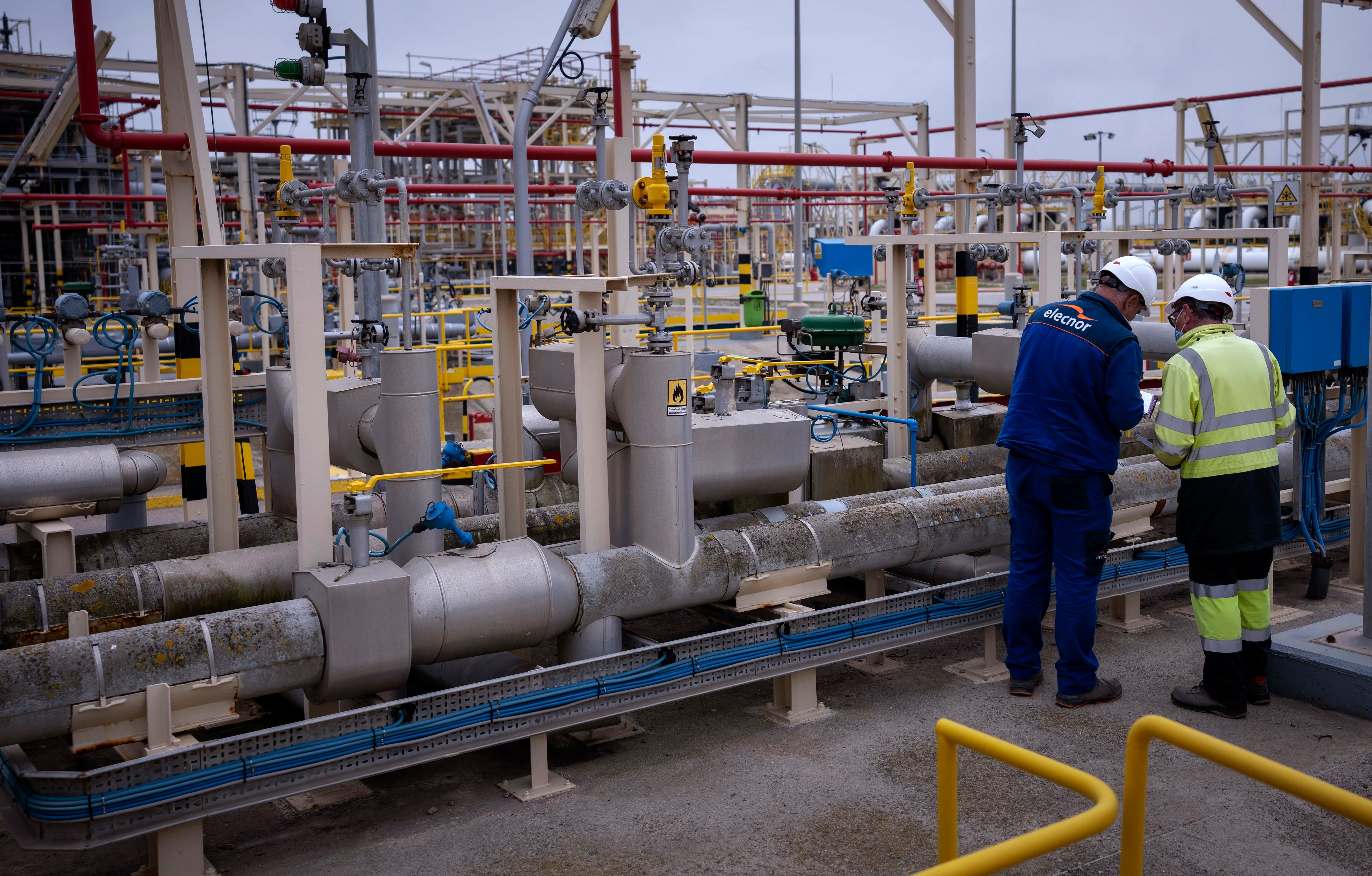 Operators work at Enagas regasification plant, the largest LNG plant in Europe, in Barcelona, Spain, on March 29, 2022.