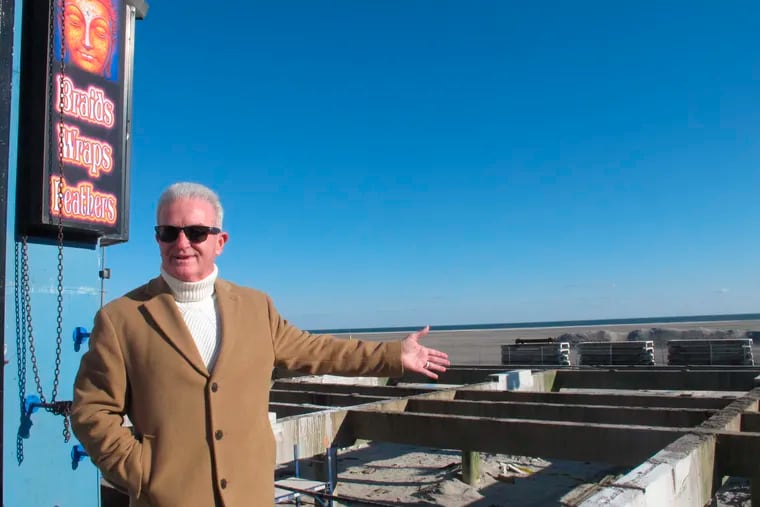 Wildwood Mayor Pete Byron gestures toward a section of the boardwalk that is being rebuilt. The popular seaside town is repairing or rebuilding most of its century-old boardwalk over the next five years.