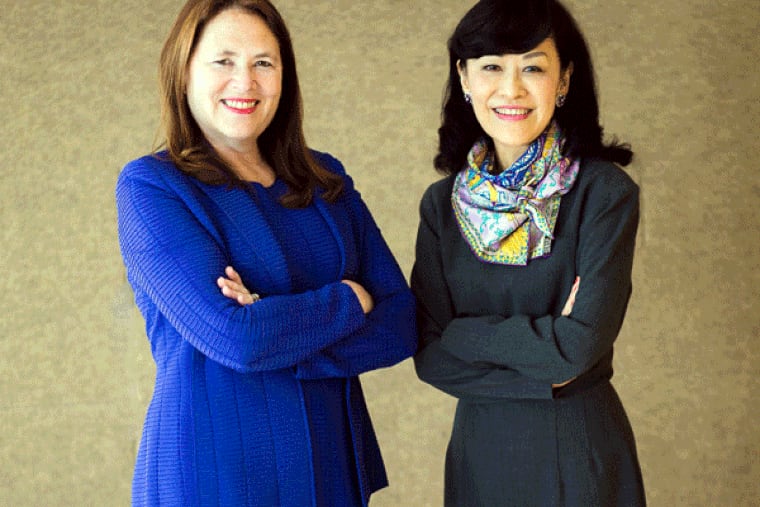 Morgan Lewis Law Firm chair Jami McKeon (left), and Suet Fern Lee, the managing partner of the Singapore office, oversaw the largest U.S. law firm, Lewis, combine with Stamford Law of Singapore.