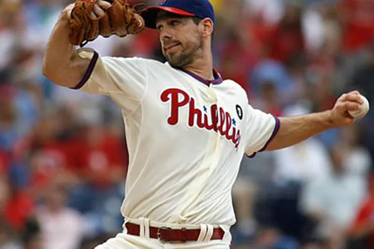 Cliff Lee pitched eight innings, allowed one earned run, and struck out seven against the Cubs. (H. Rumph Jr/AP Photo)