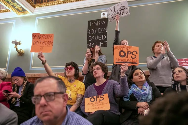 Protesters in favor of a supervised injection site sit in the gallery of City Council chambers at Philadelphia City Hall on Thursday, March 05, 2020. Discussions surrounding the site took place before Mayor Kenney's budget proposal.