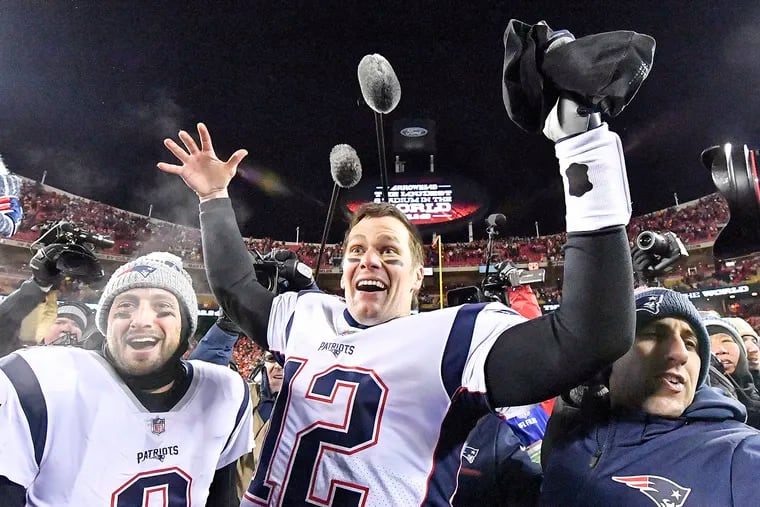 Tom Brady celebrates the Patriots' game-winning touchdown in overtime.