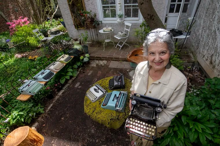 Pamela Rogow in her Garden of Typewriters next to her W.P.M Typewriter Shop in Mount Airy.