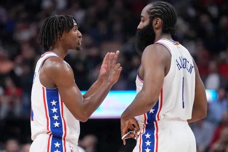 TORONTO, ON - OCTOBER 26: Tyrese Maxey #0 and James Harden #1 of the Philadelphia 76ers speak in a break against the Toronto Raptors during the first half of their basketball game at the Scotiabank Arena on October 26, 2022 in Toronto, Ontario, Canada.