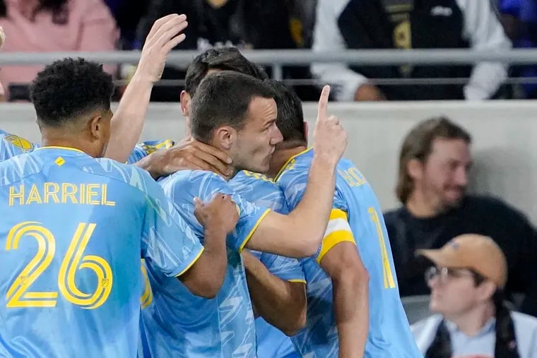 Philadelphia Union midfielder Deniel Gazdag, center, celebrates his goal with teammates during the first half of a Major League Soccer match against the Los Angeles FC Saturday, May 7, 2022, in Los Angeles. (AP Photo/Mark J. Terrill)