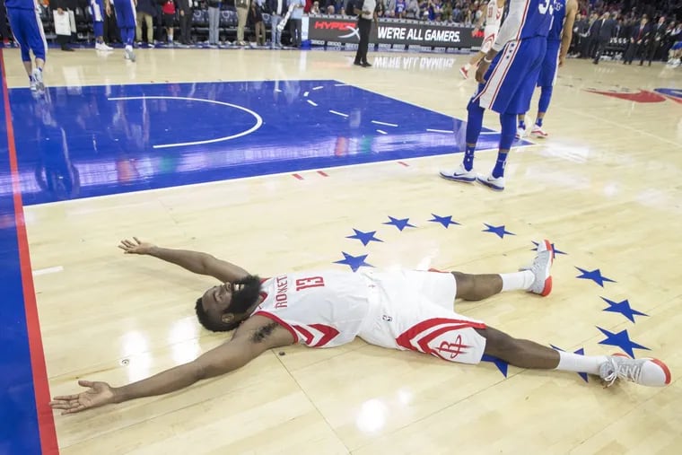 James Harden of the Houston Rockets after teammate Eric Gordon hit the game-winning three pointer to defeat the Sixers 105-104 at the Wells Fargo Center on Oct. 25.