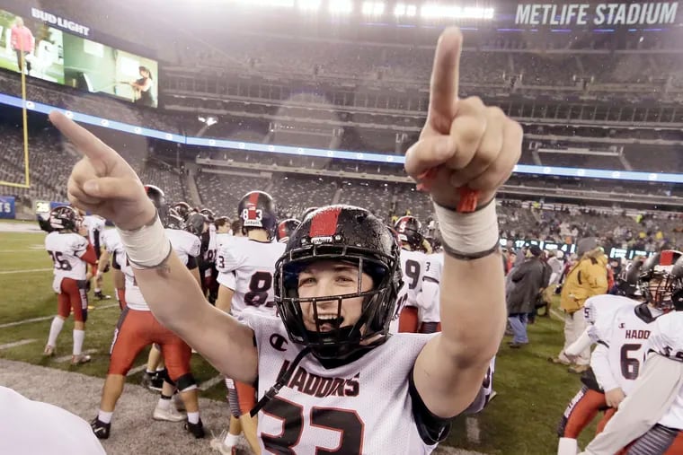 Haddonfield's Lance Forebaugh celebrates 17-7 win over Hillside in Group 2 South/Central Bowl Game in MetLife Stadium.