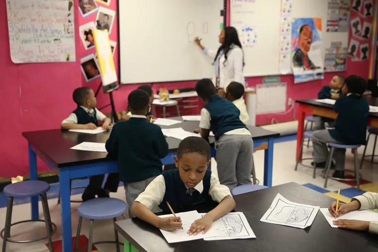 A first grader works on a drawing of King Tut's mask during art class at Global Leadership Academy Charter School in West Philadelphia in this April 2019 file photo. A charter high school proposing to follow the Global Leadership model was just rejected by the Philadelphia school board.
