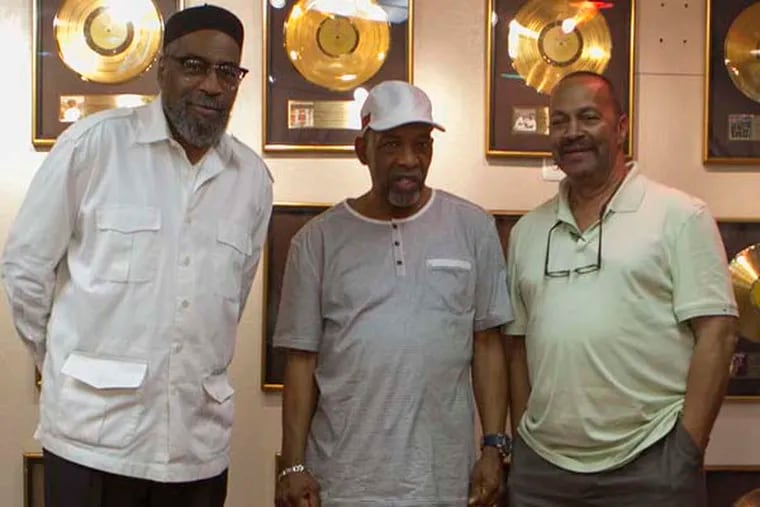 Musicians Kenneth Gamble, Leon Huff and Thom Bell stand together at Gamble and Huff Music, on Broad Street, in Philadelphia, on Thursday, May 30, 2013. Bell lives in Seattle and rarely comes east, but is back in a new partnership with Gamble and Huff. ( Stephanie Aaronson / Staff Photographer )