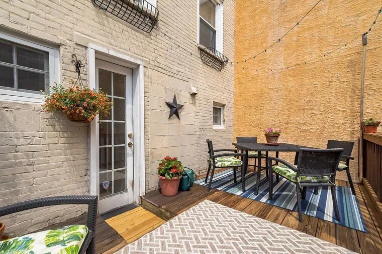 The Fitler Square townhouse has two exterior spaces, including a comfortable deck.