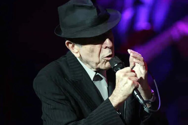 Leonard Cohen opens his concert at the Academy of Music. &quot;So much of the world is plunged in chaos and suffering, it's remarkable that we have the opportunity to gather in places like this,&quot; he said at one point. Despite his references to his age, he skipped on and off the stage between sets.
