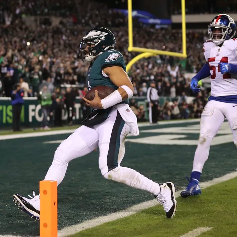 Eagles quarterback Jalen Hurts runs in for a touchdown in second quarter against the Giants, bringing the score to 28-0.