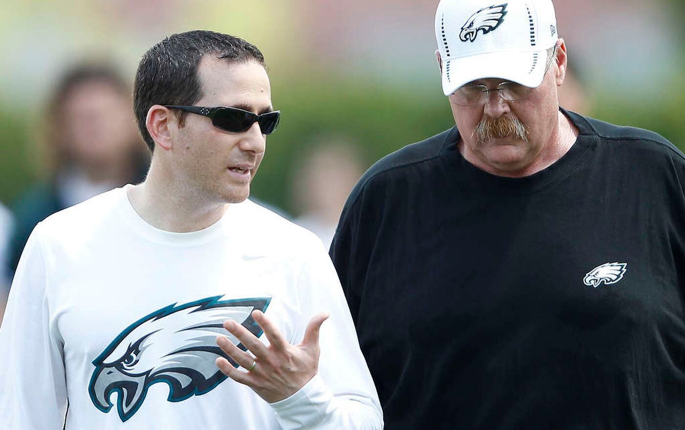 Eagles GM Howie Roseman (left) and Andy Reid in 2012. 
