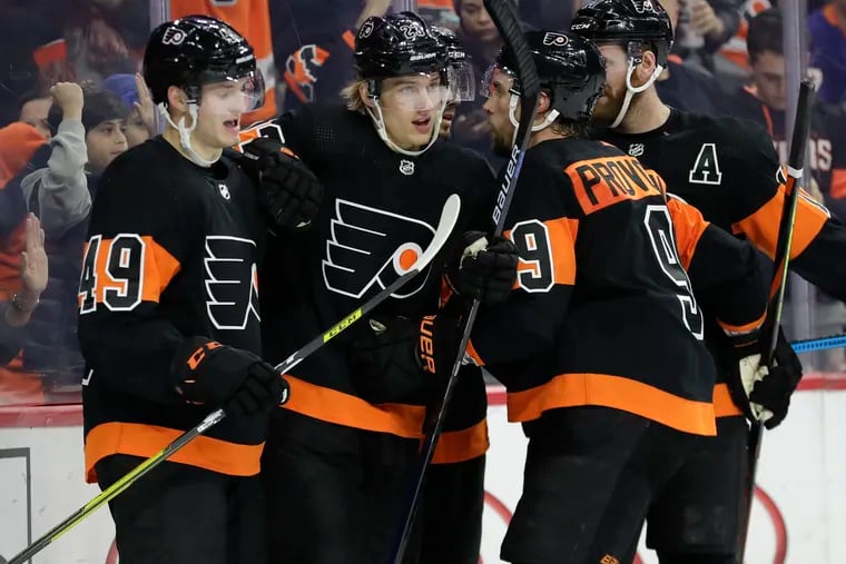 Joel Farabee (left) will return to the Flyers' lineup Monday against the visiting Rangers, while Ivan Provorov (right) will be a game-time decision because of the flu. Many Rangers are showing their support Monday for Oskar Lindblom (center).