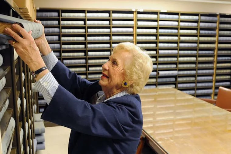 Gloria Noto, 82, the Cumberland (NJ) County Clerk, hadn't lost an election since she first won the office in 1995 -- until this past Tuesday (11/4/2014).  She is photographed Nov.6, 2014 in the basement records room pulling out the first bound book of deeds dating from 1785.   ( CLEM MURRAY / Staff Photographer )