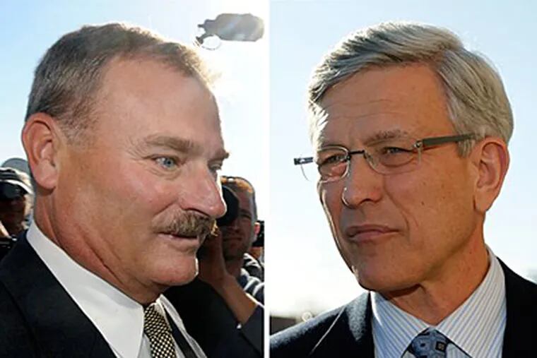 In these Nov. 7, 2011 file photos, former Penn State vice president Gary Schultz, left, and former athletic director Tim Curley, right, enter a district judge's office for an arraignment in Harrisburg Pa. (AP/File photos)