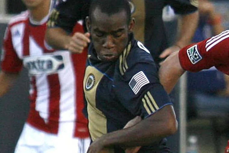 Amobi Okugo replaced Brian Carroll after he strained a hamstring against the Red Bulls. (H. Rumph Jr/AP file photo)