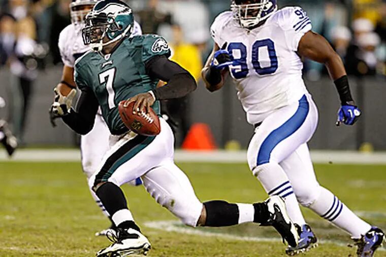 Michael Vick ran and threw for a touchdown in the Eagles 26-24 win over the Colts. (Ron Cortes/Staff Photographer)