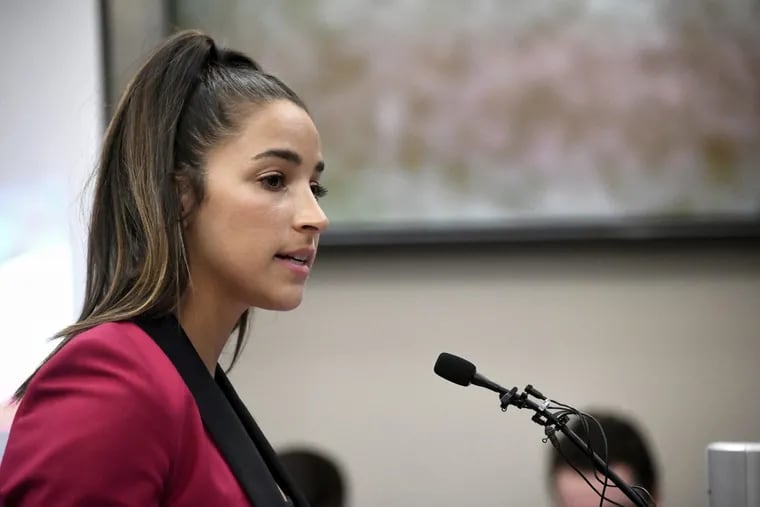In this Jan. 19, 2018, file photo, Olympic gold medalist Aly Raisman gives her victim impact statement in Lansing, Mich., during the fourth day of sentencing for former sports doctor Larry Nassar, who pled guilty to multiple counts of sexual assault.