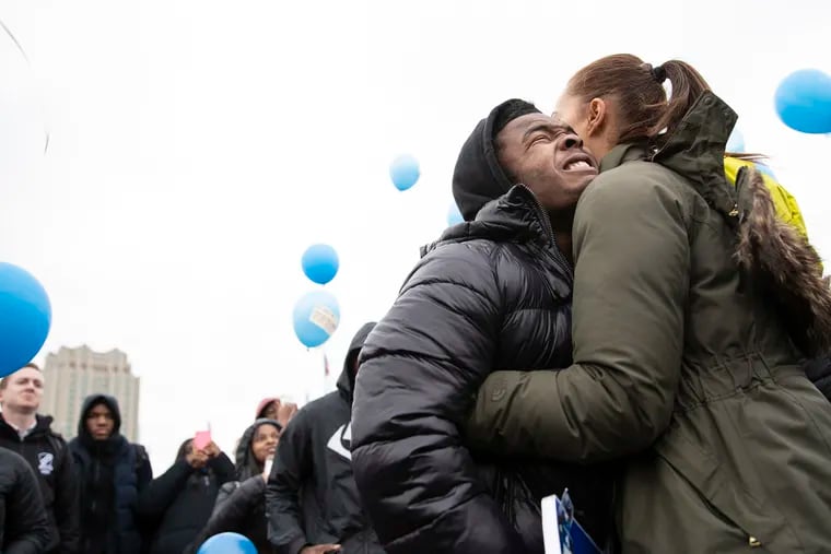 Fayaadh Gillard, brother of Suhail Gillard, gets emotional after a balloon release for Suhail at Penn's Landing on Wednesday, Dec. 04, 2019. Fayaadh fatally shot his brother in an accident. Their father, Aleem Gillard, pleaded guilty to involuntary manslaughter in the case.