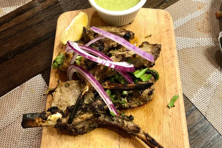 The lamb chops at Manam are roasted in the tandoor after a long marinade that makes them tender and flavorful.