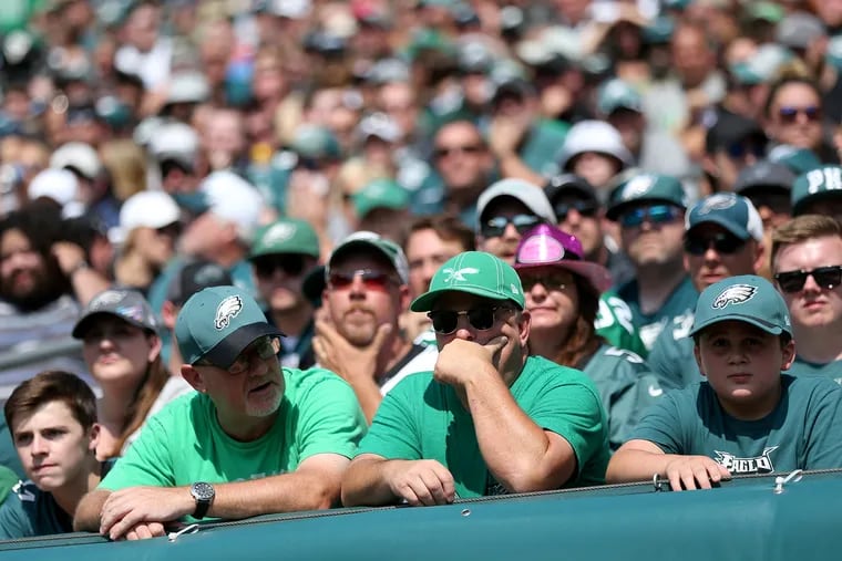 Eagles fans react after the Detroit Lions scored the first touchdown in the first quarter of a game at Lincoln Financial Field in South Philadelphia on Sunday, Sept. 22, 2019.