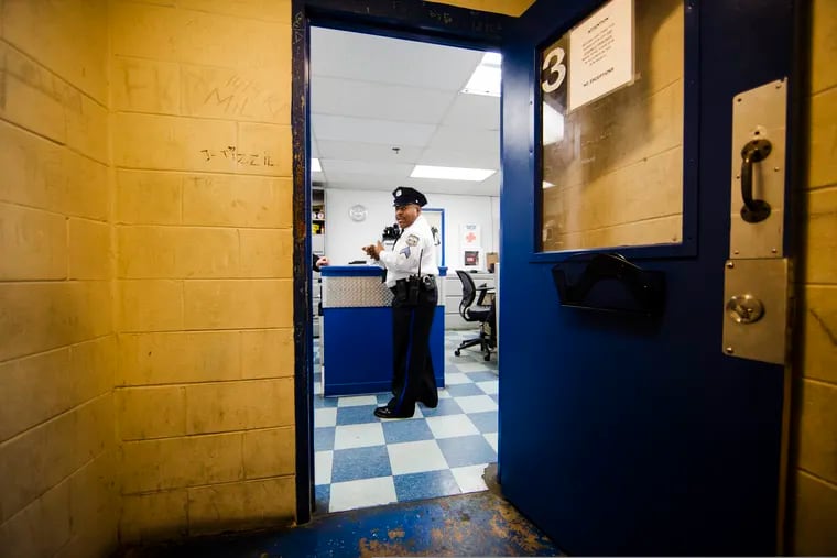In this Friday, Oct. 26, 2018, photo, Philadelphia Police Sgt. John Ross discusses the Police 9th District's juvenile holding cell in Philadelphia.  (AP Photo/Matt Rourke)