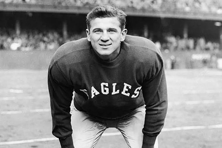 Chuck Bednarik poses for a photo in 1951, the first of the eight years in which he was named an All-NFL linebacker. (AP Photo)