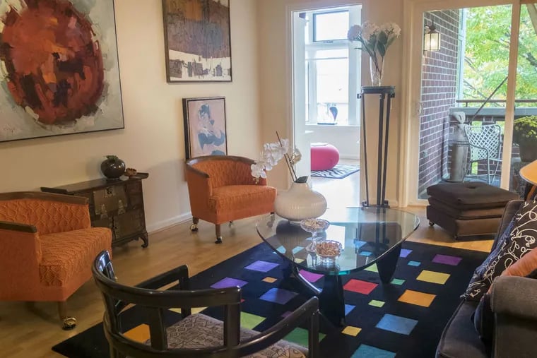 The living room of Rita Apter's unit in the Waverly Heights retirement community in Gladwyne is a showcase for her art.