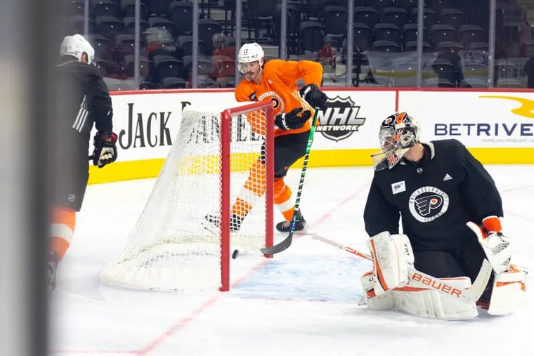 Zack MacEwen, 17, shoots during the Philadelphia Flyers morning skate ahead of their home game against the Boston Bruins on Wednesday.