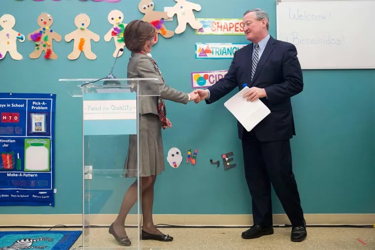 Philadelphia Mayor Jim Kenney greets the William Penn Foundation's Janet Haas during a news conference back in March. The foundation has awarded the city up to $100 million towards Kenney’s plan to remake the city’s parks, libraries and rec centers.