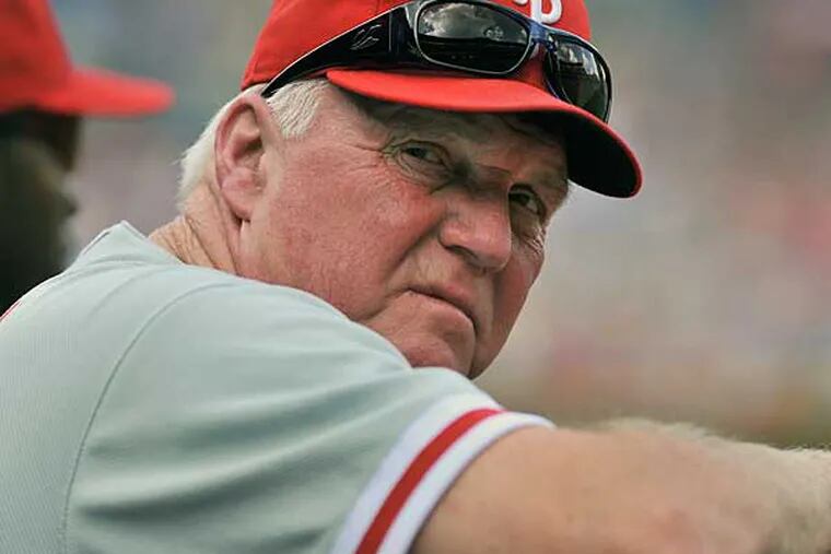 Philadelphia Phillies manager Charlie Manuel watches from the dugout during the first inning against the Atlanta Braves at a baseball game Saturday, Sept. 1, 2012, at Turner Field in Atlanta. (AP Photo/Gregory Smith)