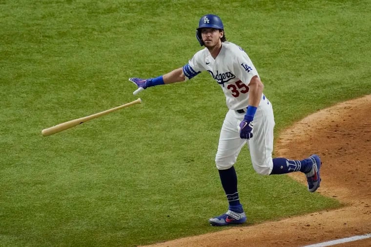 Dodger Cody Bellinger watches his two-run home run against the Rays in the fourth inning of Game 1 Tuesday night.