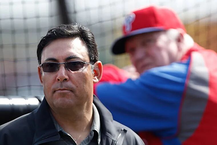 Phillies' GM Ruben Amaro Jr., left, and manager Charlie Manuel. (David Maialetti/Staff Photographer)