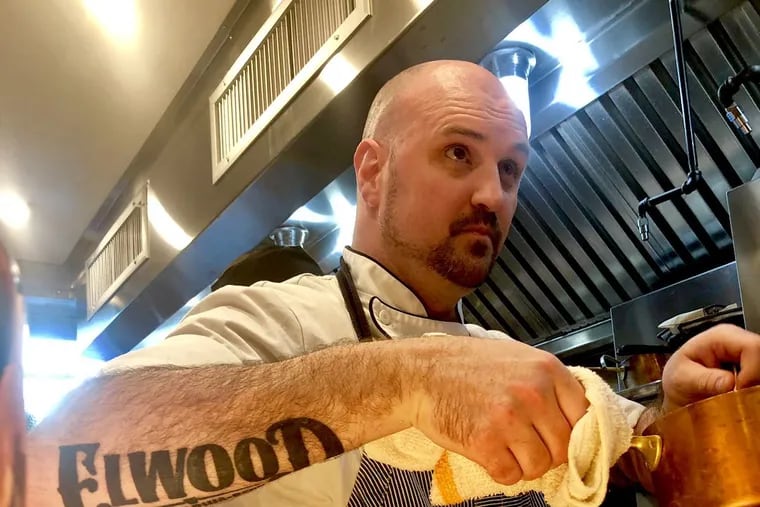 Chef Adam Diltz cooking at Elwood, his BYOB in Fishtown.