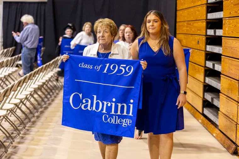 Alumni from every year at Cabrini University walk down the center for the Cabrini Legacy Celebration of 67 years in Radnor on Sunday, May 19, 2024.