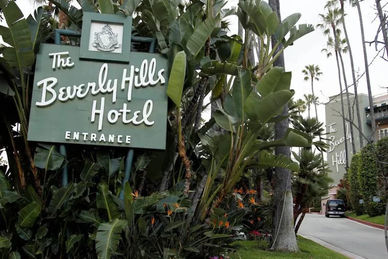 The entrance to the Beverly Hills Hotel is seen in Beverly Hills, Calif.  Hollywood is responding to harsh new laws in Brunei by boycotting the Beverly Hills Hotel.  (AP Photo/Matt Sayles, File)