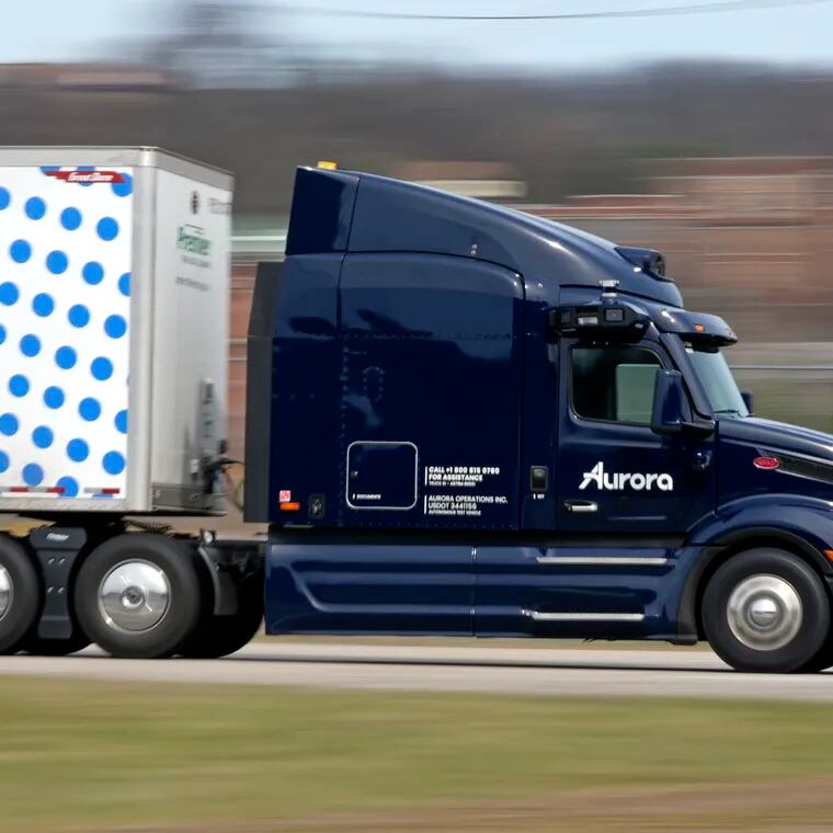 A self-driving tractor trailer maneuvers around a test track in Pittsburgh in March.