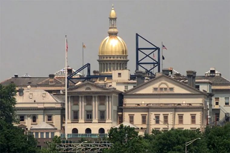 The New Jersey Statehouse in Trenton as seen from across the Delaware River in Morrisville, Pa.