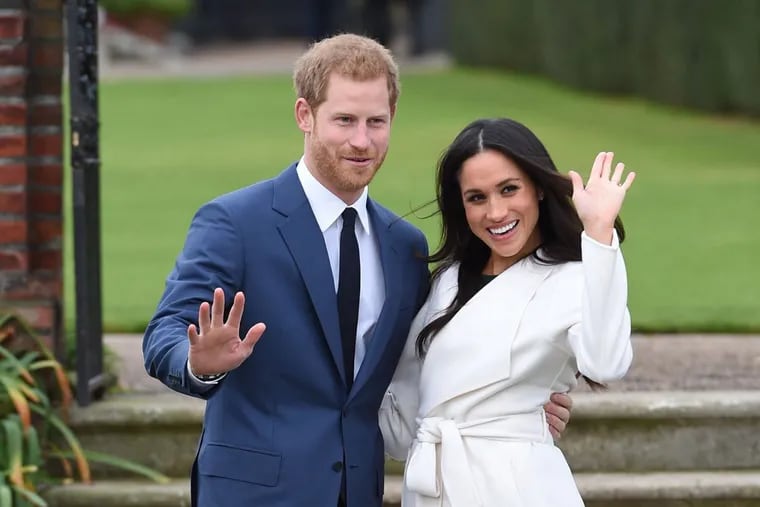 Prince Harry and Meghan Markle after announcing their engagement at Kensington Palace, in London.