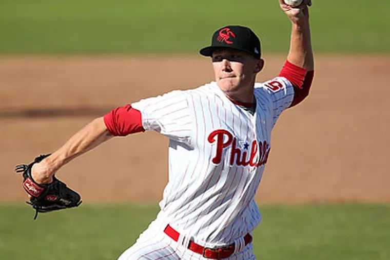 Phillies prospect Jake Diekman delivers a pitch during an Arizona Fall League game. (AP file photo)
