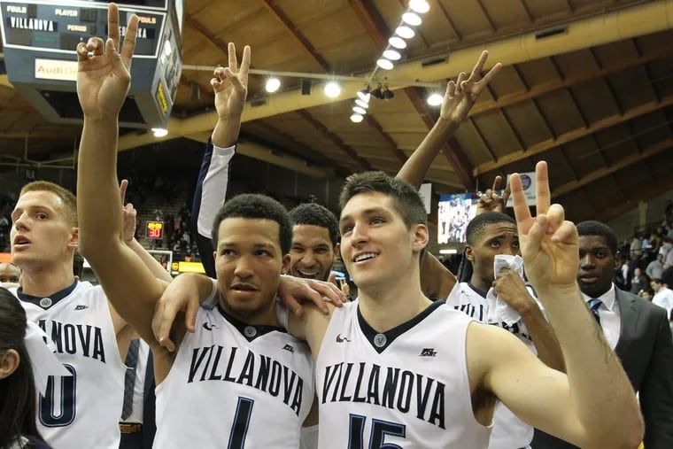 Jalen Brunson  (second from left), Ryan Arcidiacono (right) and teammates celebrating a victory in November 2015.