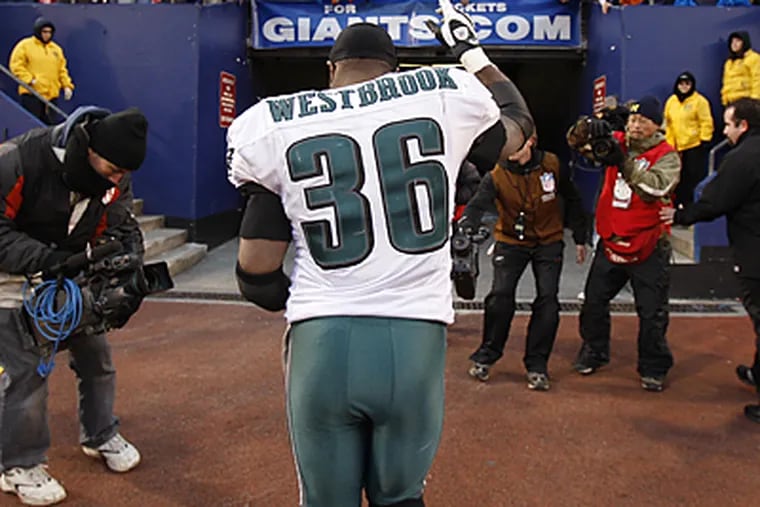 Brian Westbrook carried the ball a career-high 33 times in the Eagles' 20-14 win over the Giants. (Ron Cortes/Staff Photographer)