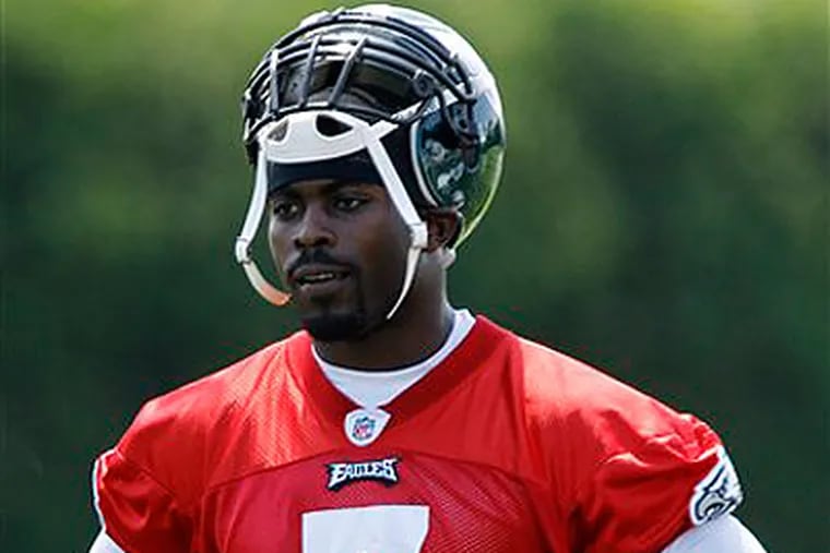 Although Michael Vick has been cleared in the shooting case, he could still be punished by the NFL. (AP Photo/Matt Slocum)