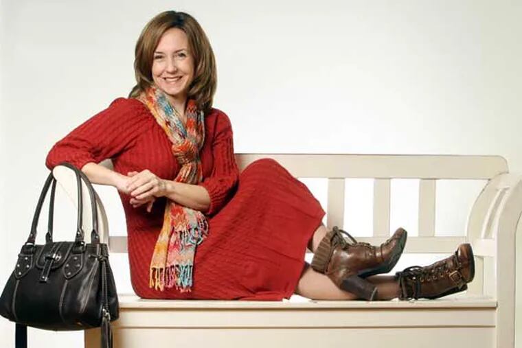Karen Giberson, president of the Accessories Council, with a favorite scarf, purse and shoes.
