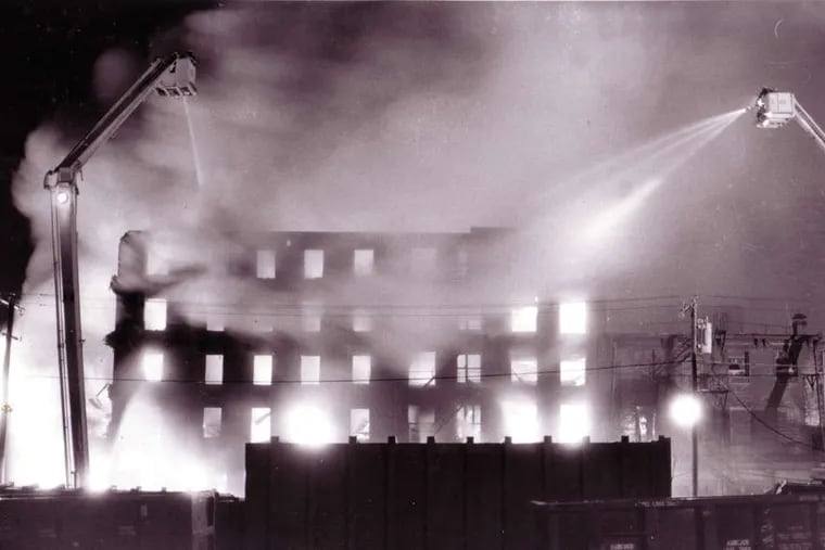 A vacant building ablaze at Fourth and Brown, at the Karff-Eisemann Co. industrial complex, in 1986.