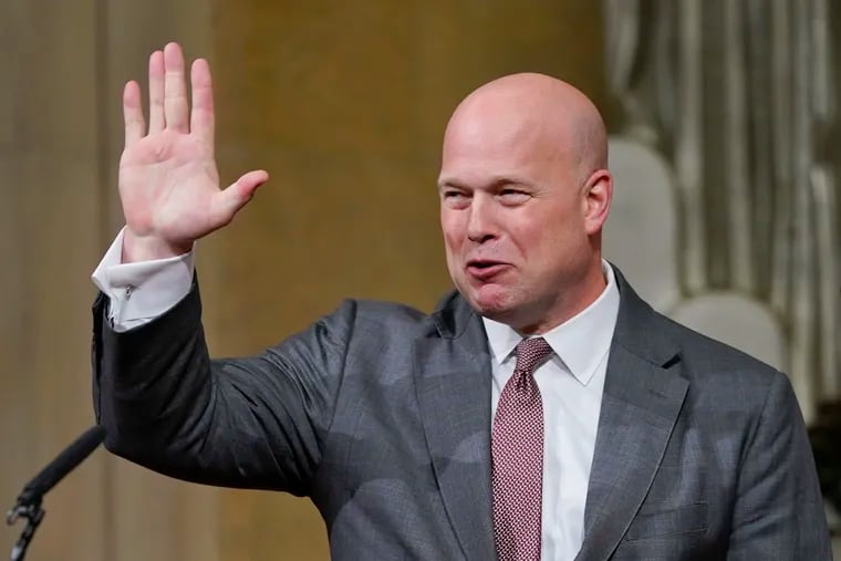 Acting Attorney General Matthew Whitaker gestures after speaking at the Dept. of Justice's Annual Veterans Appreciation Day ceremony on Thursday.