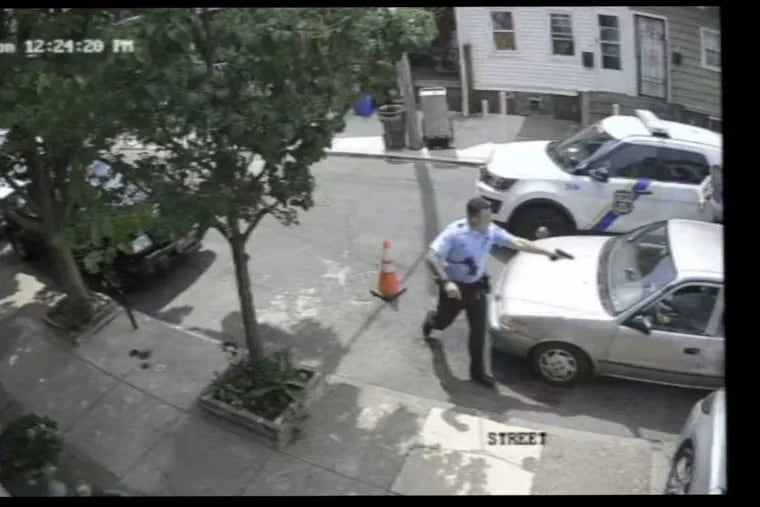 A surveillance video released by a lawyer for the family of Eddie Irizarry shows Officer Mark Dial approaching Irizarry’s Toyota Corolla in the100 block of East Willard Street with his gun drawn and then shooting Irizarry through the window, in Kensington on Aug. 14.