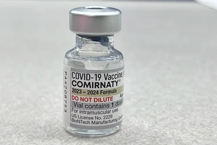 A vial of the COVID-19 vaccine 2023-2024 Formula of COMIRNATY made by Pfizer and BioNTech. Philadelphia health officials say people should get their new COVID vaccines when they can, and to have patience with insurance issues and shipping delays that have impacted the rollout.