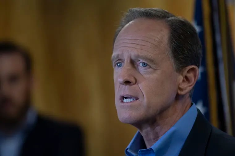 Sen. Pat Toomey (R-Pa.) speaks at the podium during a news conference at the U.S. Customs House on Aug. 6, 2019 in Philadelphia, Pa.